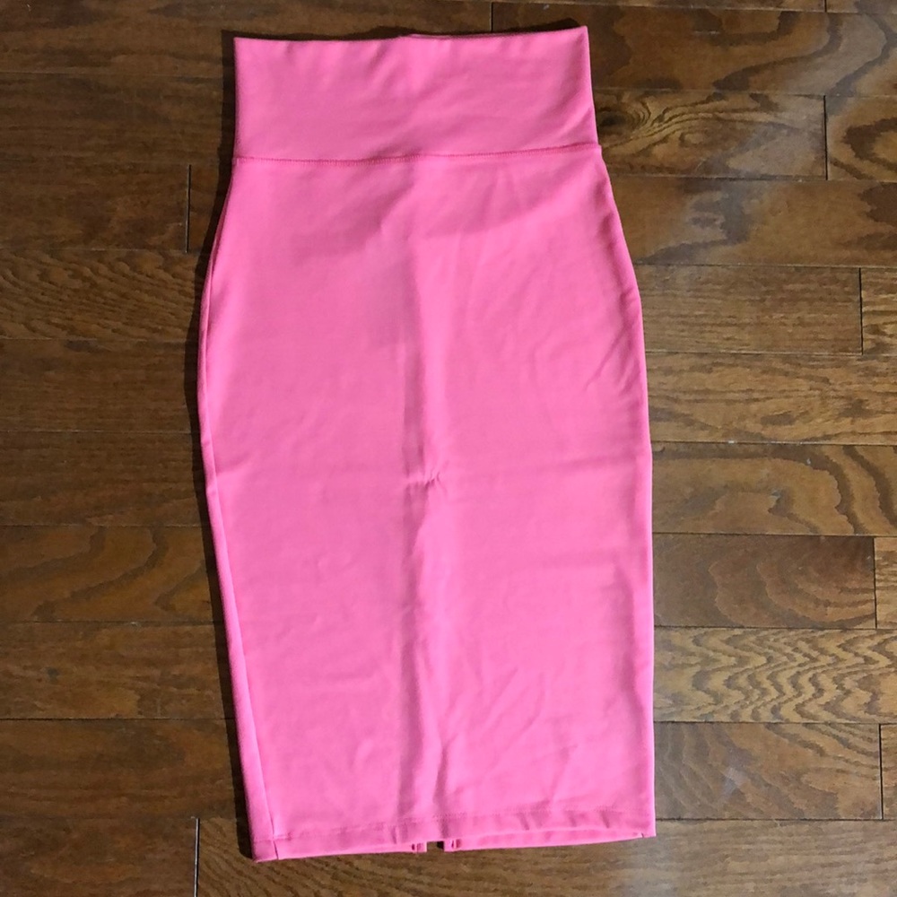 BEBE bandage skirt with slit in back. Brand new!